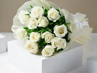 FlowerAura Premium Fresh Live Flower Bouquet of Enchanting 12 White Roses In Wrapping Paper Gift For Birthday | Anniversary | Love | Home Decor | Fathers Day Gift For Dad (Same Day