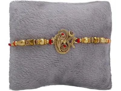 Riddhika Ventures Glorious Gold Plated Auspicious OM and Diamond Ring Rakhi with Roli Chawal an